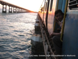 a train and a bridge over sea near rameswaram