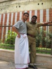 dhoti wearing dinesh wagle and a policeman who was on duty at the meenaxi temple madhurai