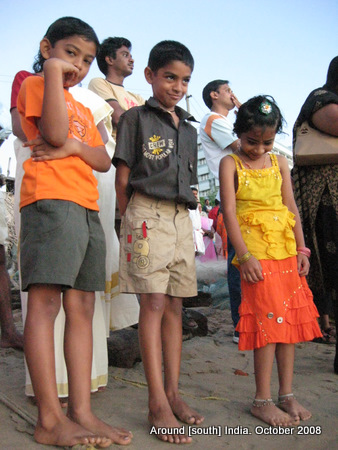kids waiting to see the sun rise at a beach in Kanyakumari