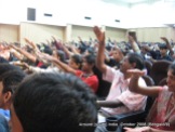 participants of a handwriting workshop in bangalore learn the art of clapping
