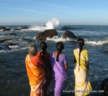 women watching sea waves in kanyakumari