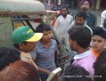 an auto hits a rickshaw