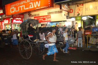 runner-pulled rickshaw of kolkata, india