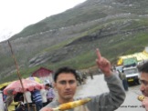 Dinesh Wagle and Gokul Dahal eating roasted corn on their way back to Manali from Rohtang Pass, Himachal Pradesh, India