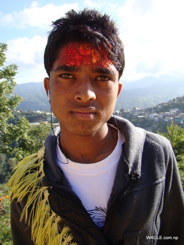boy dadeldhura nepal on the day of dashain tika