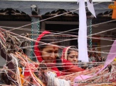 A Marwari devotee circumventing the Cheer in Basantapur, Kathmandu as part of Holi celebrations by her community