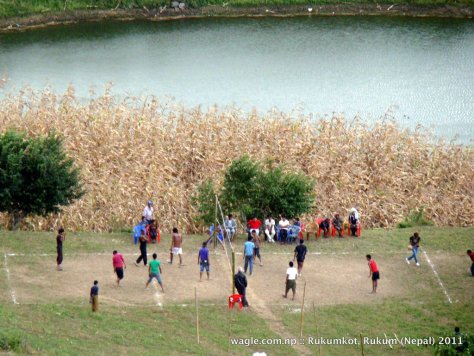 1-playing volleyball by the pond in rukumkot