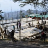 Nepali migrant workers constructing a building